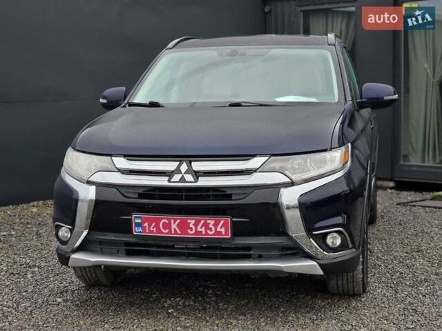 Синий Мицубиси Аутлендер, объемом двигателя 2.4 л и пробегом 134 тыс. км за 13999 $, фото 6 на Automoto.ua