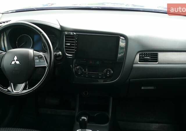 Синій Міцубісі Аутлендер, об'ємом двигуна 2.36 л та пробігом 161 тис. км за 14400 $, фото 13 на Automoto.ua