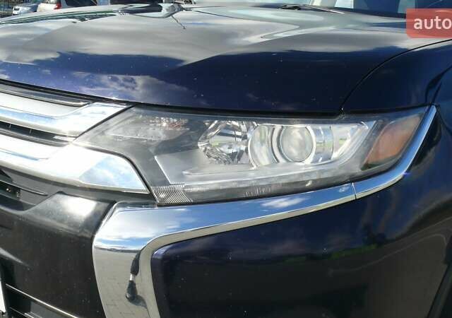 Синій Міцубісі Аутлендер, об'ємом двигуна 2.36 л та пробігом 161 тис. км за 14400 $, фото 8 на Automoto.ua