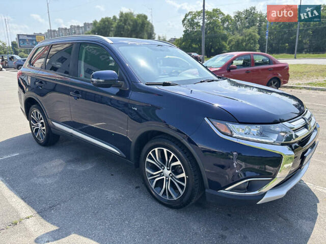 Синий Мицубиси Аутлендер, объемом двигателя 3 л и пробегом 157 тыс. км за 15000 $, фото 9 на Automoto.ua