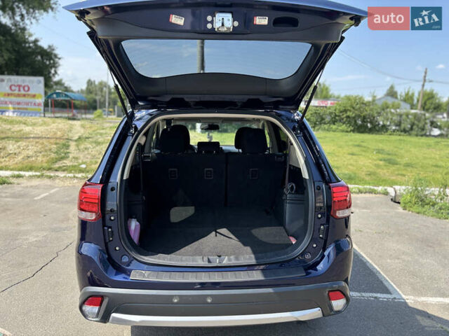 Синий Мицубиси Аутлендер, объемом двигателя 3 л и пробегом 157 тыс. км за 15000 $, фото 28 на Automoto.ua