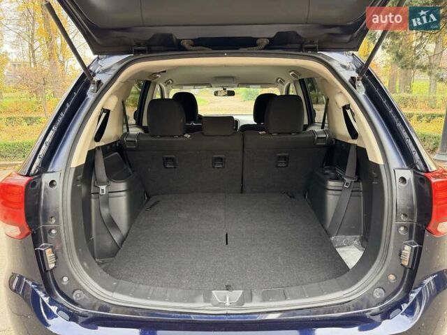 Синий Мицубиси Аутлендер, объемом двигателя 3 л и пробегом 123 тыс. км за 15900 $, фото 28 на Automoto.ua