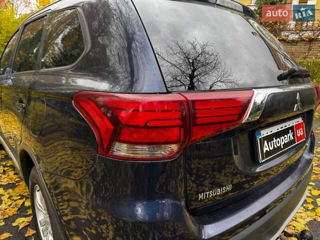 Синий Мицубиси Аутлендер, объемом двигателя 2 л и пробегом 238 тыс. км за 14940 $, фото 8 на Automoto.ua