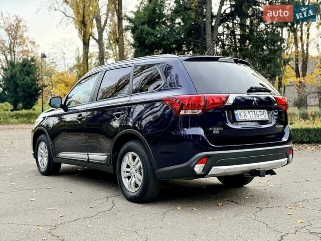 Синий Мицубиси Аутлендер, объемом двигателя 3 л и пробегом 123 тыс. км за 15900 $, фото 4 на Automoto.ua