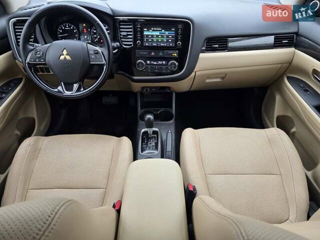 Синий Мицубиси Аутлендер, объемом двигателя 2.4 л и пробегом 134 тыс. км за 13999 $, фото 28 на Automoto.ua