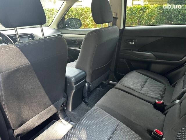 Синій Міцубісі Аутлендер, об'ємом двигуна 2 л та пробігом 238 тис. км за 15990 $, фото 18 на Automoto.ua