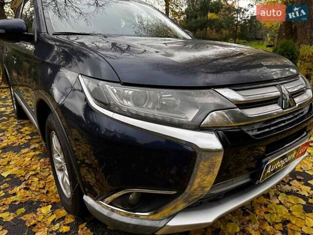 Синий Мицубиси Аутлендер, объемом двигателя 2 л и пробегом 238 тыс. км за 14940 $, фото 3 на Automoto.ua