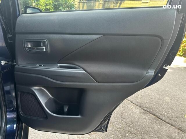 Синій Міцубісі Аутлендер, об'ємом двигуна 2 л та пробігом 238 тис. км за 15990 $, фото 21 на Automoto.ua