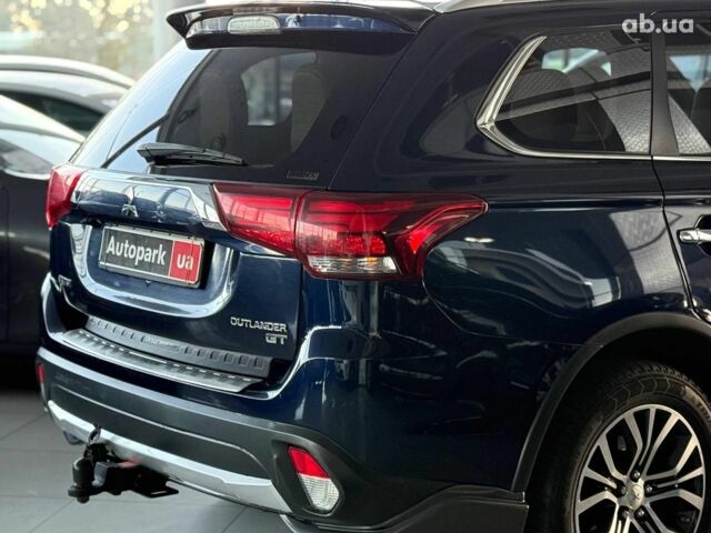 Синий Мицубиси Аутлендер, объемом двигателя 3 л и пробегом 144 тыс. км за 15940 $, фото 8 на Automoto.ua