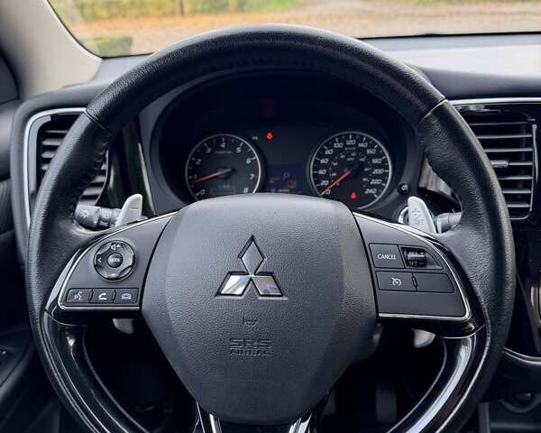 Синий Мицубиси Аутлендер, объемом двигателя 3 л и пробегом 123 тыс. км за 15900 $, фото 17 на Automoto.ua