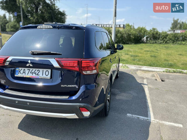 Синий Мицубиси Аутлендер, объемом двигателя 3 л и пробегом 157 тыс. км за 15000 $, фото 6 на Automoto.ua