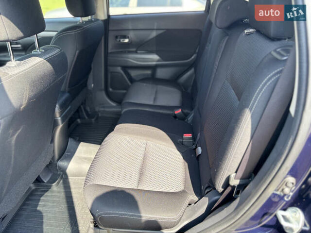 Синий Мицубиси Аутлендер, объемом двигателя 3 л и пробегом 157 тыс. км за 15000 $, фото 25 на Automoto.ua