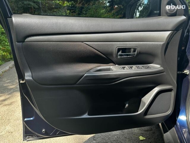 Синій Міцубісі Аутлендер, об'ємом двигуна 2 л та пробігом 238 тис. км за 15990 $, фото 8 на Automoto.ua