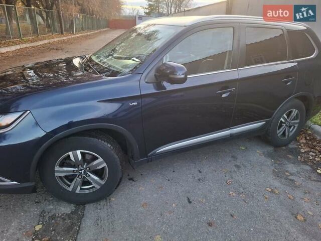 Синий Мицубиси Аутлендер, объемом двигателя 3 л и пробегом 93 тыс. км за 21500 $, фото 19 на Automoto.ua