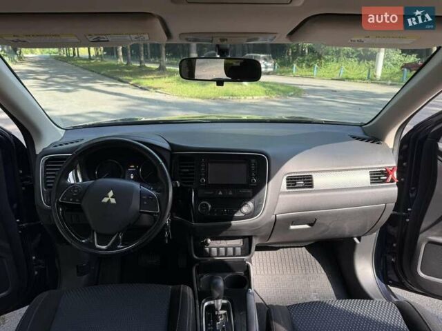 Синий Мицубиси Аутлендер, объемом двигателя 2.4 л и пробегом 102 тыс. км за 15000 $, фото 19 на Automoto.ua