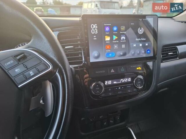 Синий Мицубиси Аутлендер, объемом двигателя 3 л и пробегом 93 тыс. км за 21500 $, фото 24 на Automoto.ua