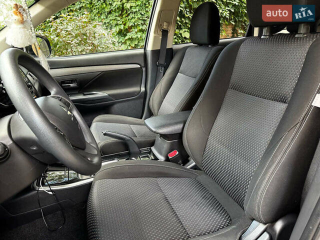 Синий Мицубиси Аутлендер, объемом двигателя 2.4 л и пробегом 144 тыс. км за 15490 $, фото 17 на Automoto.ua