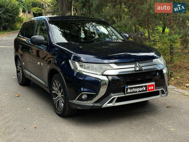 Синий Мицубиси Аутлендер, объемом двигателя 2.4 л и пробегом 144 тыс. км за 15490 $, фото 2 на Automoto.ua