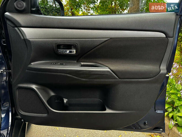 Синий Мицубиси Аутлендер, объемом двигателя 2.4 л и пробегом 144 тыс. км за 15490 $, фото 25 на Automoto.ua