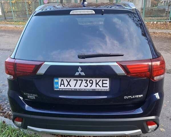 Синий Мицубиси Аутлендер, объемом двигателя 3 л и пробегом 93 тыс. км за 21500 $, фото 6 на Automoto.ua