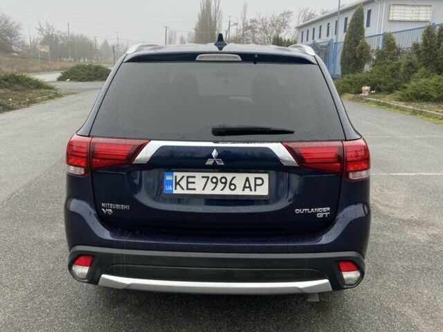 Синий Мицубиси Аутлендер, объемом двигателя 3 л и пробегом 120 тыс. км за 14500 $, фото 3 на Automoto.ua