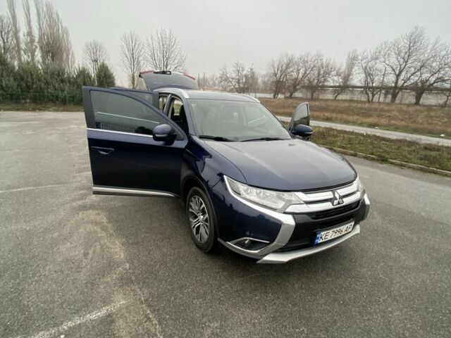 Синий Мицубиси Аутлендер, объемом двигателя 3 л и пробегом 120 тыс. км за 14500 $, фото 1 на Automoto.ua