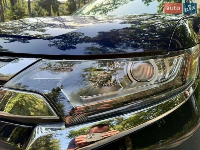 Синий Мицубиси Аутлендер, объемом двигателя 2.4 л и пробегом 102 тыс. км за 15000 $, фото 6 на Automoto.ua