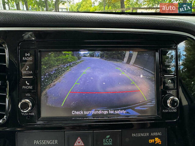 Синий Мицубиси Аутлендер, объемом двигателя 2.4 л и пробегом 144 тыс. км за 15490 $, фото 13 на Automoto.ua