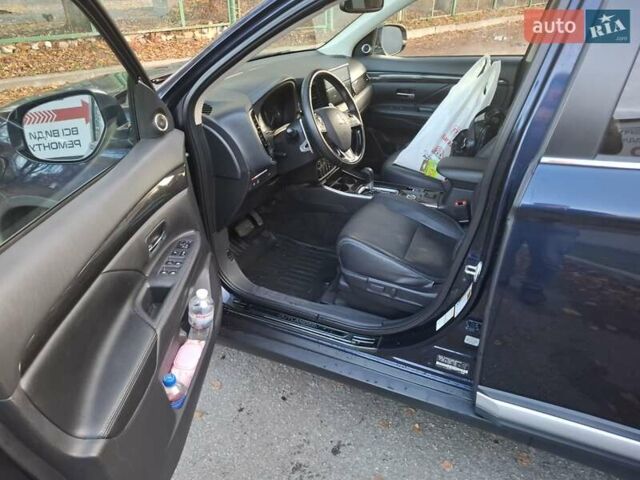 Синий Мицубиси Аутлендер, объемом двигателя 3 л и пробегом 93 тыс. км за 21500 $, фото 14 на Automoto.ua