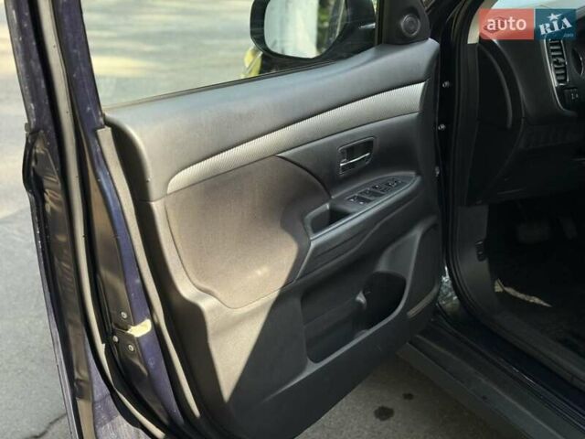 Синий Мицубиси Аутлендер, объемом двигателя 2.4 л и пробегом 102 тыс. км за 15000 $, фото 10 на Automoto.ua