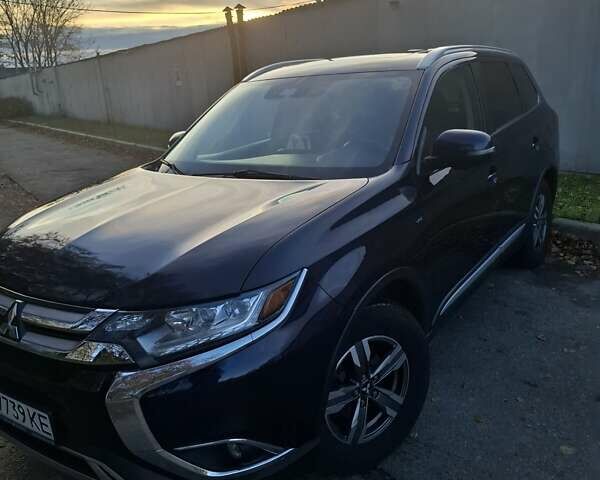 Синий Мицубиси Аутлендер, объемом двигателя 3 л и пробегом 93 тыс. км за 21500 $, фото 4 на Automoto.ua