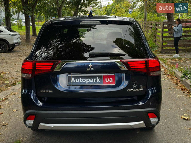 Синий Мицубиси Аутлендер, объемом двигателя 2.4 л и пробегом 144 тыс. км за 15490 $, фото 6 на Automoto.ua