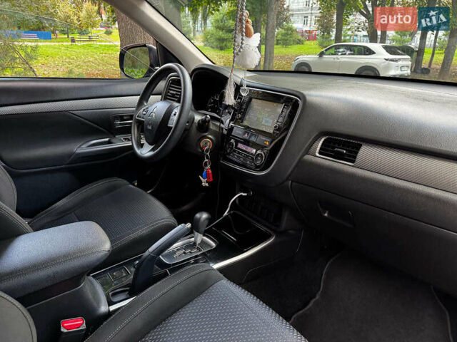 Синий Мицубиси Аутлендер, объемом двигателя 2.4 л и пробегом 144 тыс. км за 15490 $, фото 24 на Automoto.ua