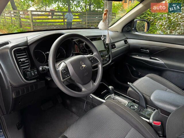 Синий Мицубиси Аутлендер, объемом двигателя 2.4 л и пробегом 144 тыс. км за 15490 $, фото 10 на Automoto.ua