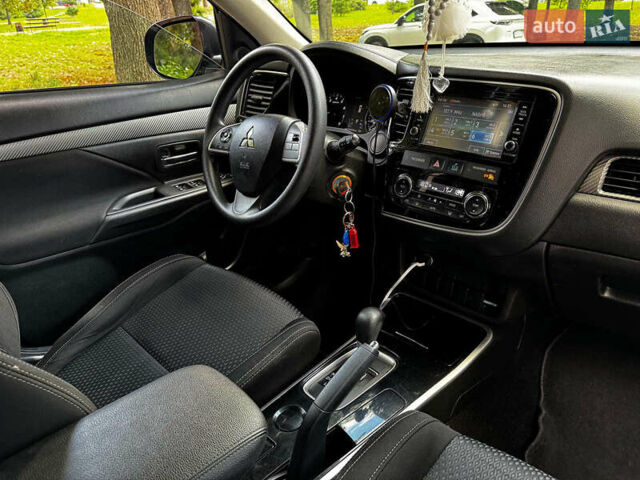 Синий Мицубиси Аутлендер, объемом двигателя 2.4 л и пробегом 144 тыс. км за 15490 $, фото 26 на Automoto.ua