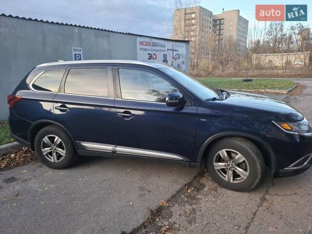 Синий Мицубиси Аутлендер, объемом двигателя 3 л и пробегом 93 тыс. км за 21500 $, фото 3 на Automoto.ua