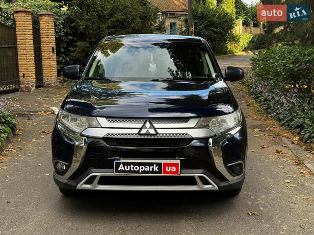 Синий Мицубиси Аутлендер, объемом двигателя 2.4 л и пробегом 144 тыс. км за 15490 $, фото 3 на Automoto.ua