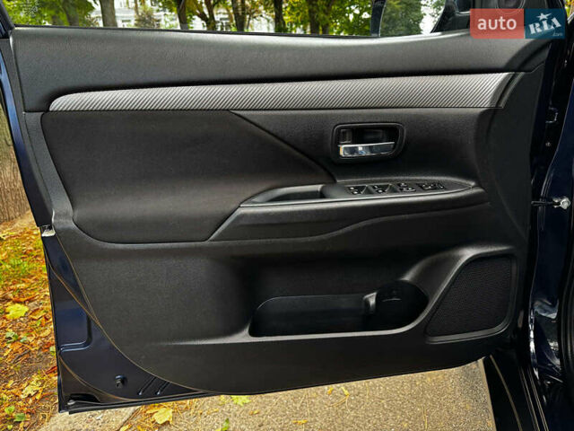 Синий Мицубиси Аутлендер, объемом двигателя 2.4 л и пробегом 144 тыс. км за 15490 $, фото 8 на Automoto.ua