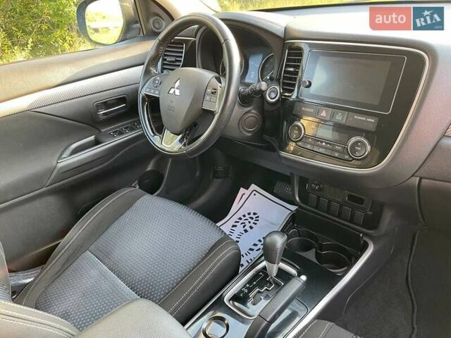 Синий Мицубиси Аутлендер, объемом двигателя 2.4 л и пробегом 221 тыс. км за 12300 $, фото 16 на Automoto.ua