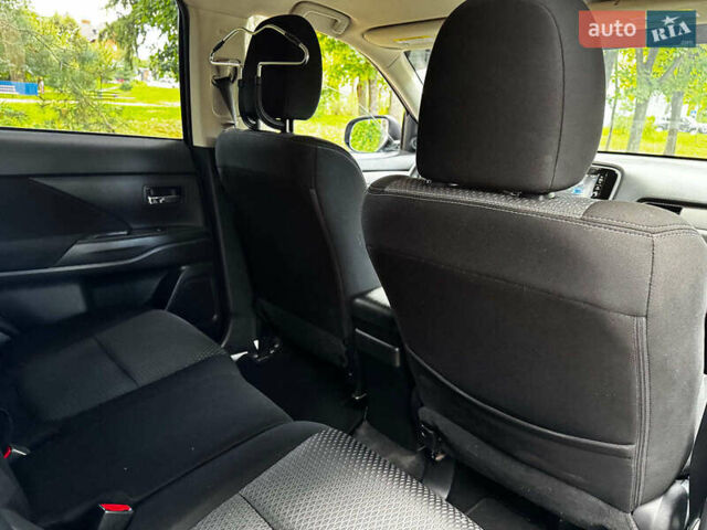 Синий Мицубиси Аутлендер, объемом двигателя 2.4 л и пробегом 144 тыс. км за 15490 $, фото 23 на Automoto.ua