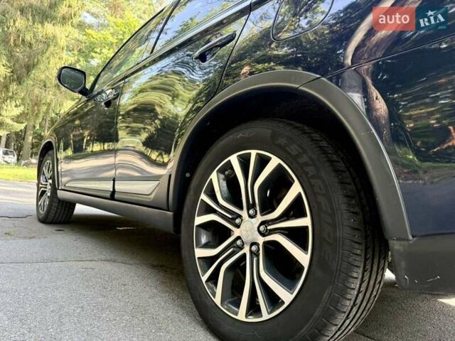 Синий Мицубиси Аутлендер, объемом двигателя 2.4 л и пробегом 102 тыс. км за 15000 $, фото 9 на Automoto.ua