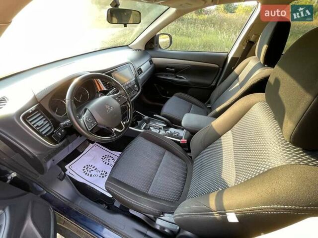 Синий Мицубиси Аутлендер, объемом двигателя 2.4 л и пробегом 221 тыс. км за 12300 $, фото 12 на Automoto.ua