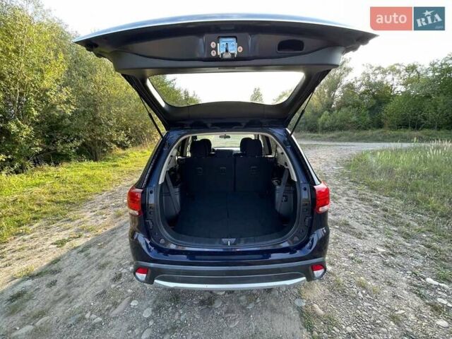 Синий Мицубиси Аутлендер, объемом двигателя 2.4 л и пробегом 221 тыс. км за 12300 $, фото 14 на Automoto.ua