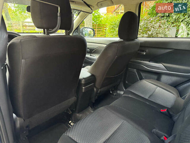 Синий Мицубиси Аутлендер, объемом двигателя 2.4 л и пробегом 144 тыс. км за 15490 $, фото 20 на Automoto.ua