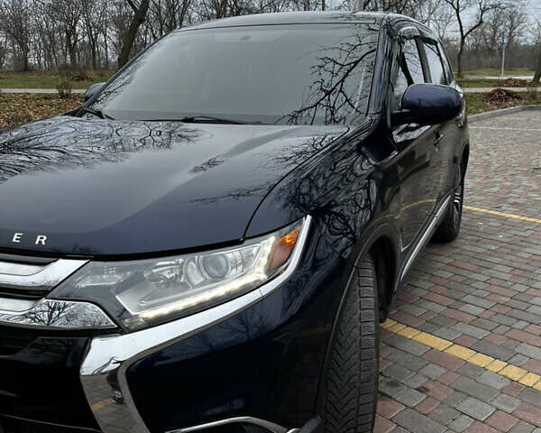 Синій Міцубісі Аутлендер, об'ємом двигуна 2.36 л та пробігом 144 тис. км за 16700 $, фото 3 на Automoto.ua