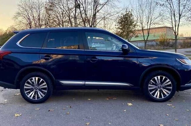 Синий Мицубиси Аутлендер, объемом двигателя 2.4 л и пробегом 71 тыс. км за 11800 $, фото 7 на Automoto.ua