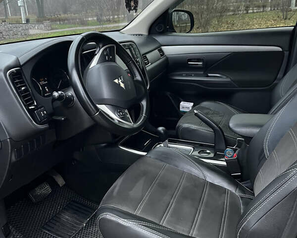 Синій Міцубісі Аутлендер, об'ємом двигуна 2.36 л та пробігом 144 тис. км за 16700 $, фото 15 на Automoto.ua