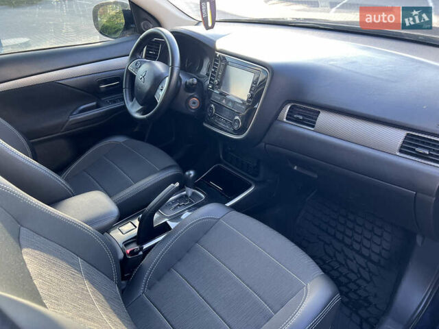 Синий Мицубиси Аутлендер, объемом двигателя 2.36 л и пробегом 150 тыс. км за 15500 $, фото 11 на Automoto.ua