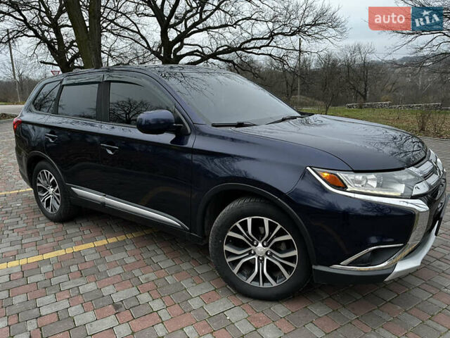 Синій Міцубісі Аутлендер, об'ємом двигуна 2.36 л та пробігом 144 тис. км за 16700 $, фото 4 на Automoto.ua