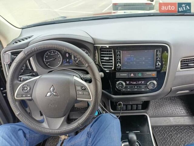 Синий Мицубиси Аутлендер, объемом двигателя 2.4 л и пробегом 134 тыс. км за 15200 $, фото 12 на Automoto.ua